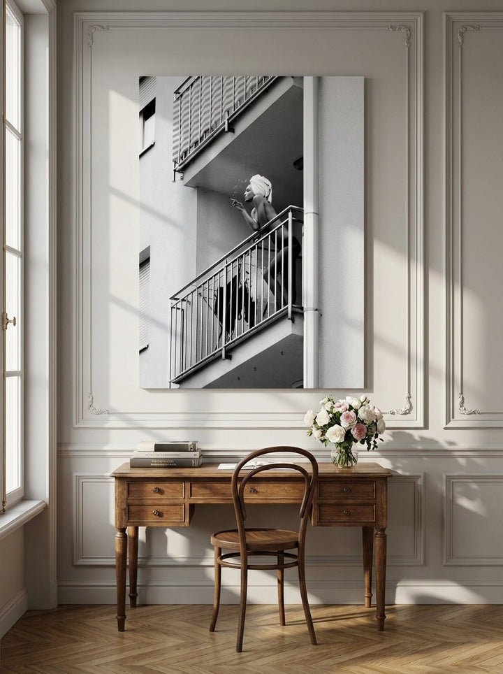 Stretched canvas wall art styled on the wall in a Parisian home office