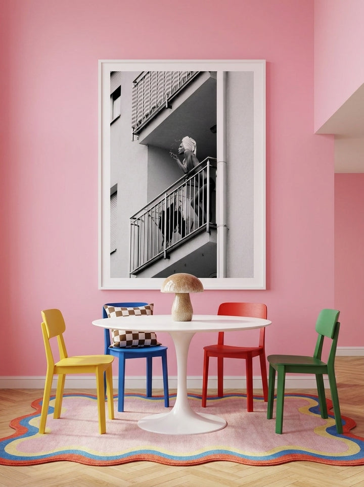 Oversized statement modern wall art print styled on the wall in a colourful eclectic dining room
