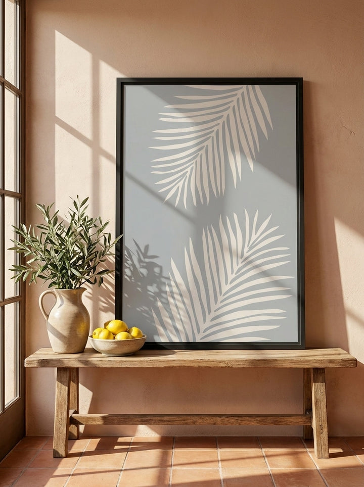 Modern wall art print standing on a bench in a Mediterranean dining room