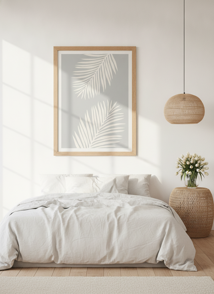 Modern wall art print styled on the wall in a bright Scandinavian bedroom