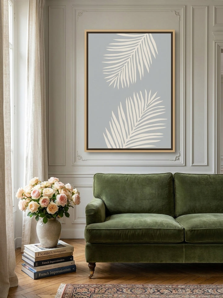 Oversized statement canvas wall art with a natural timber surround styled on the wall in a Parisian living room