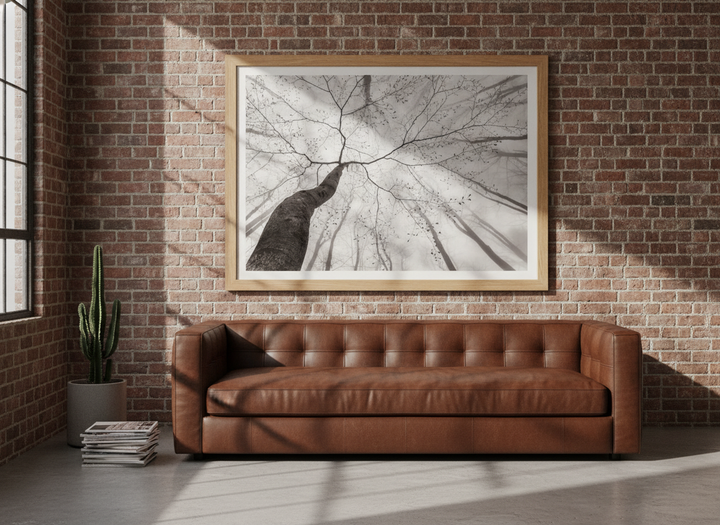 Modern wall art print styled on the wall in an industrial loft living room