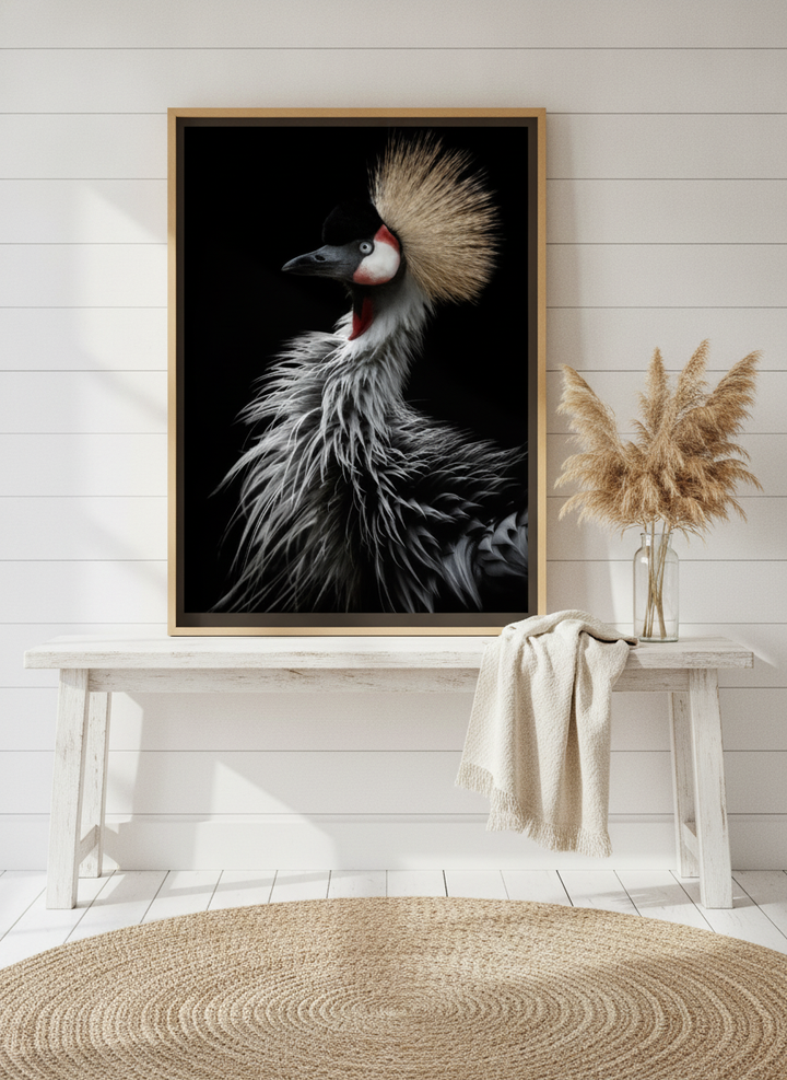 Canvas wall art with a natural timber surround standing on a console in a coastal home office