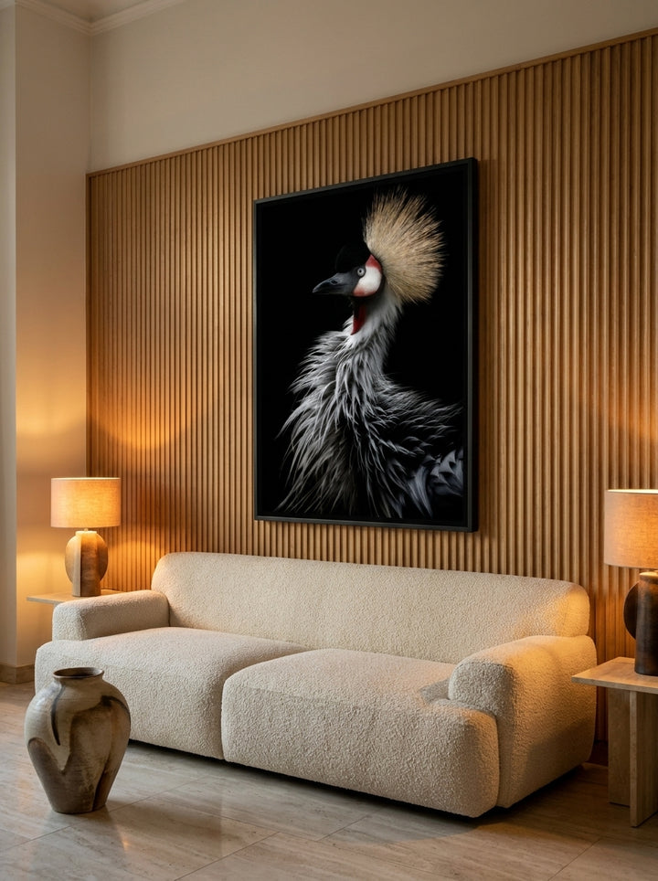 Oversized statement canvas wall art with a black surround styled on the wall in a luxe living room