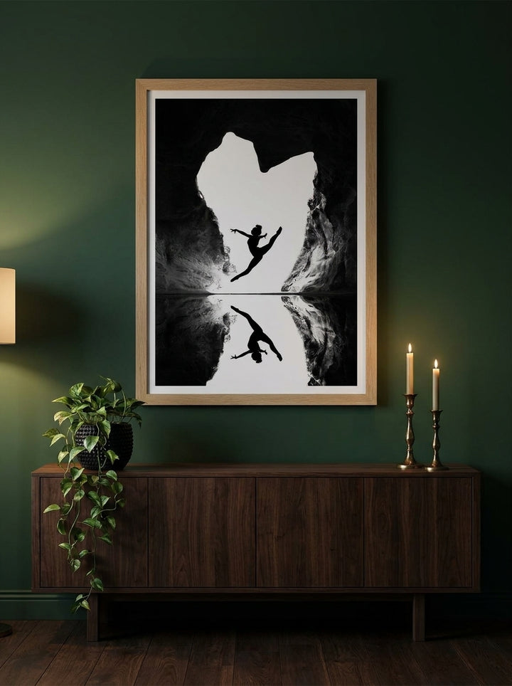 Modern wall art print styled on the wall in a moody living room