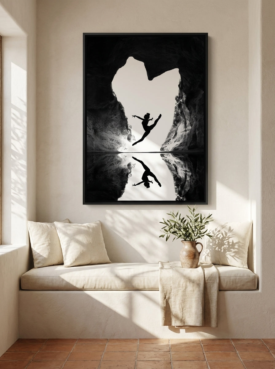 Oversized statement canvas wall art with a black surround styled on the wall in a Mediterranean living room