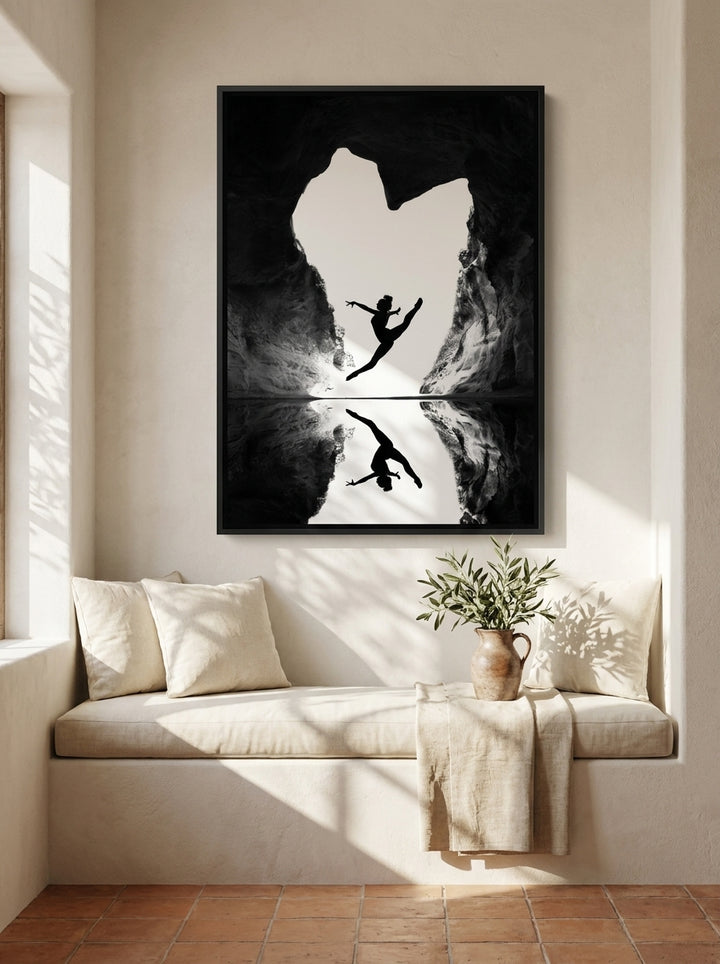 Oversized statement canvas wall art with a black surround styled on the wall in a Mediterranean living room