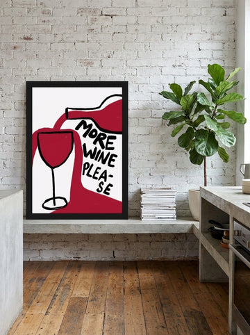 Modern wall art print standing on a kitchen bench in an industrial loft kitchen
