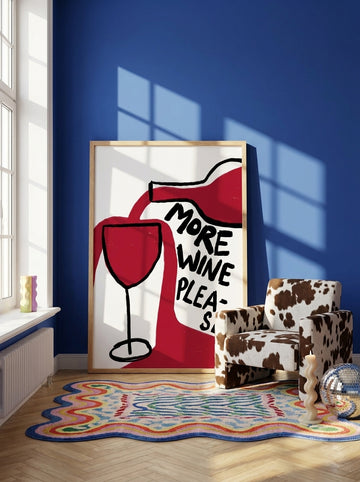 Oversized statement modern wall art print leaning against the wall in a colourful eclectic bedroom