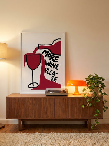 Modern wall art print standing on a sideboard in a retro 70s living room
