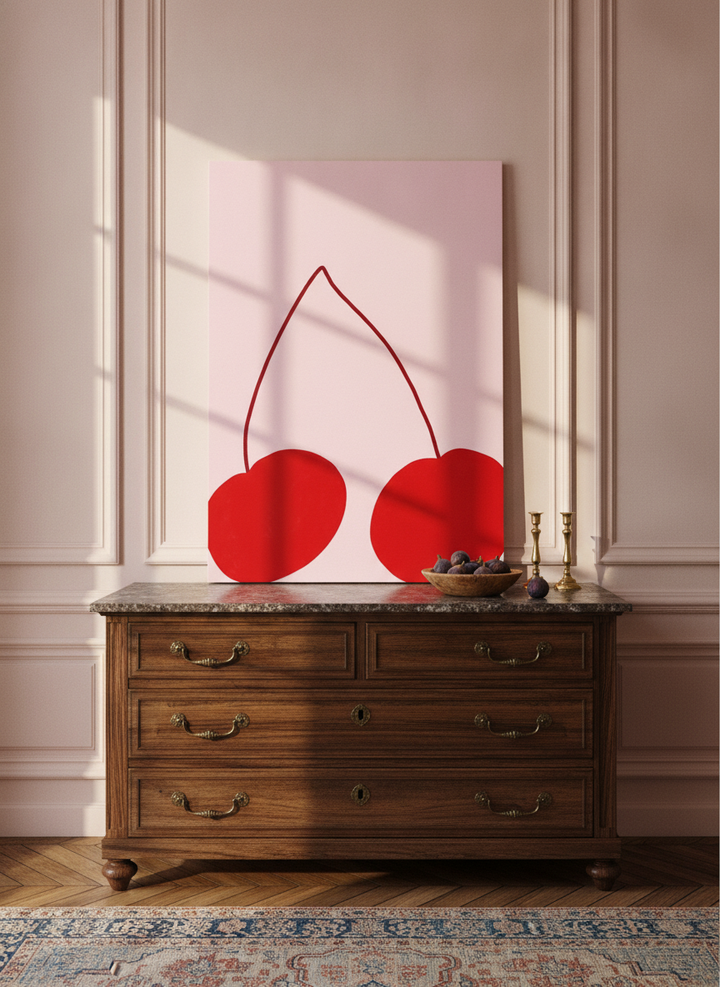 Stretched canvas wall art standing on a sideboard in a Parisian living room