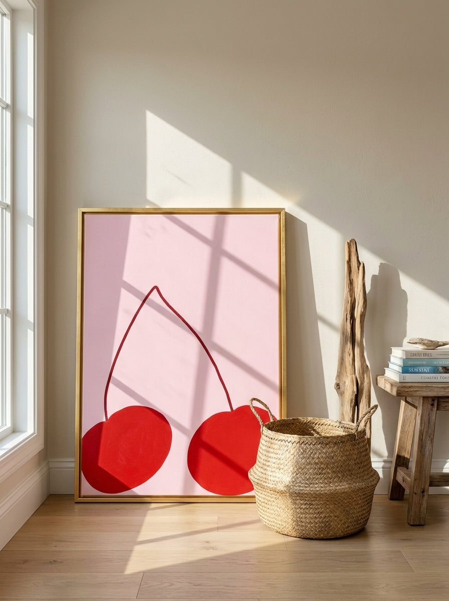 Canvas wall art with a gold leaf surround leaning against the wall in a coastal living room