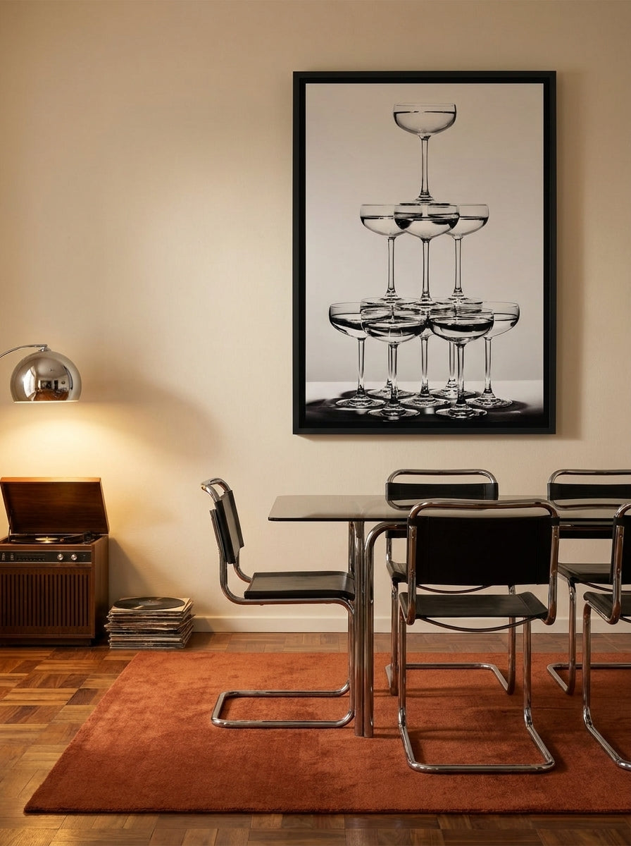 Canvas wall art with a black surround styled on the wall in a retro 70s dining room