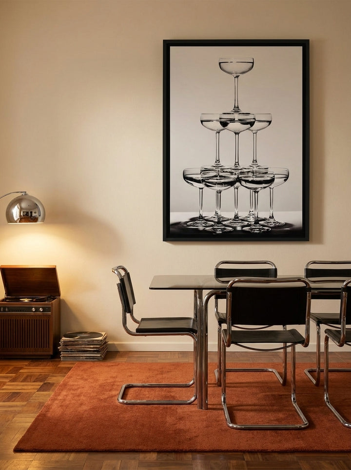 Canvas wall art with a black surround styled on the wall in a retro 70s dining room