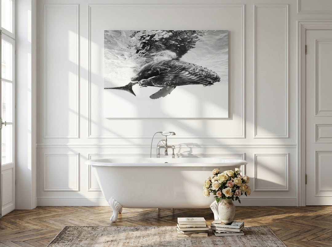 Stretched canvas wall art styled on the wall in a Parisian bathroom
