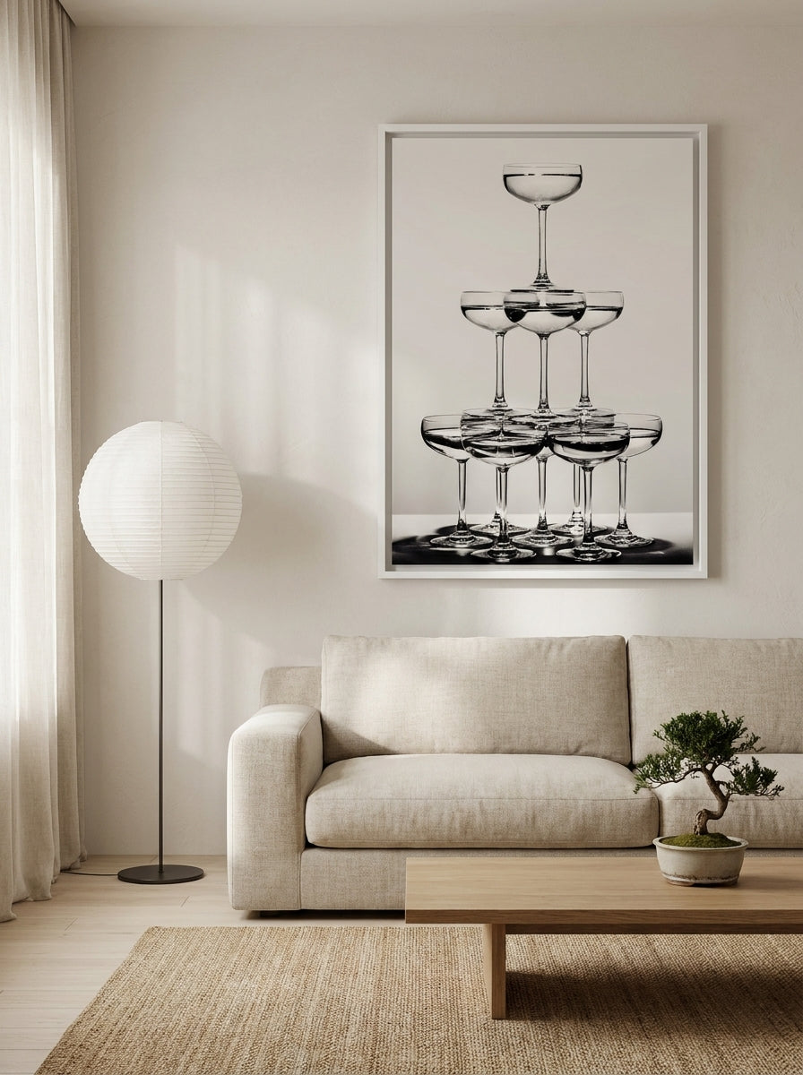 Oversized statement canvas wall art with a white surround styled on the wall in a warm Japandi living room