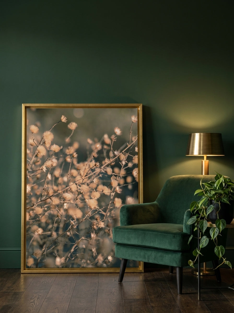 Canvas wall art with a gold leaf surround leaning against the wall in a moody bedroom