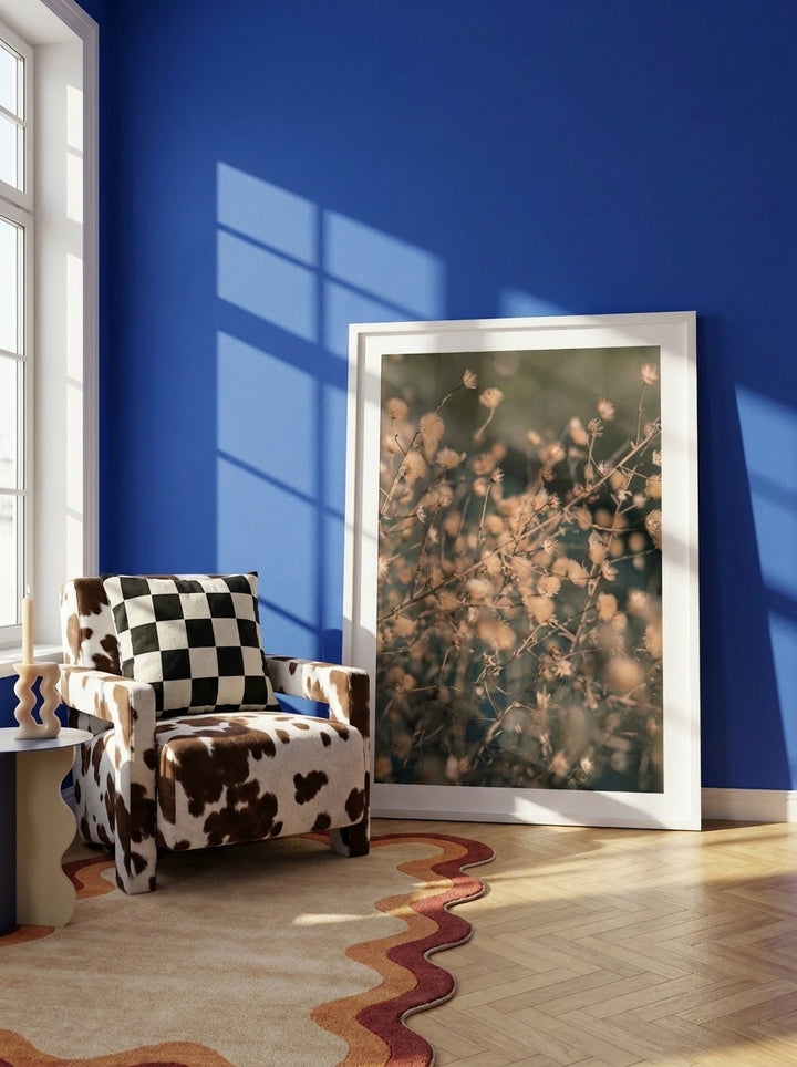 Modern wall art print leaning against the wall in a colourful eclectic bedroom