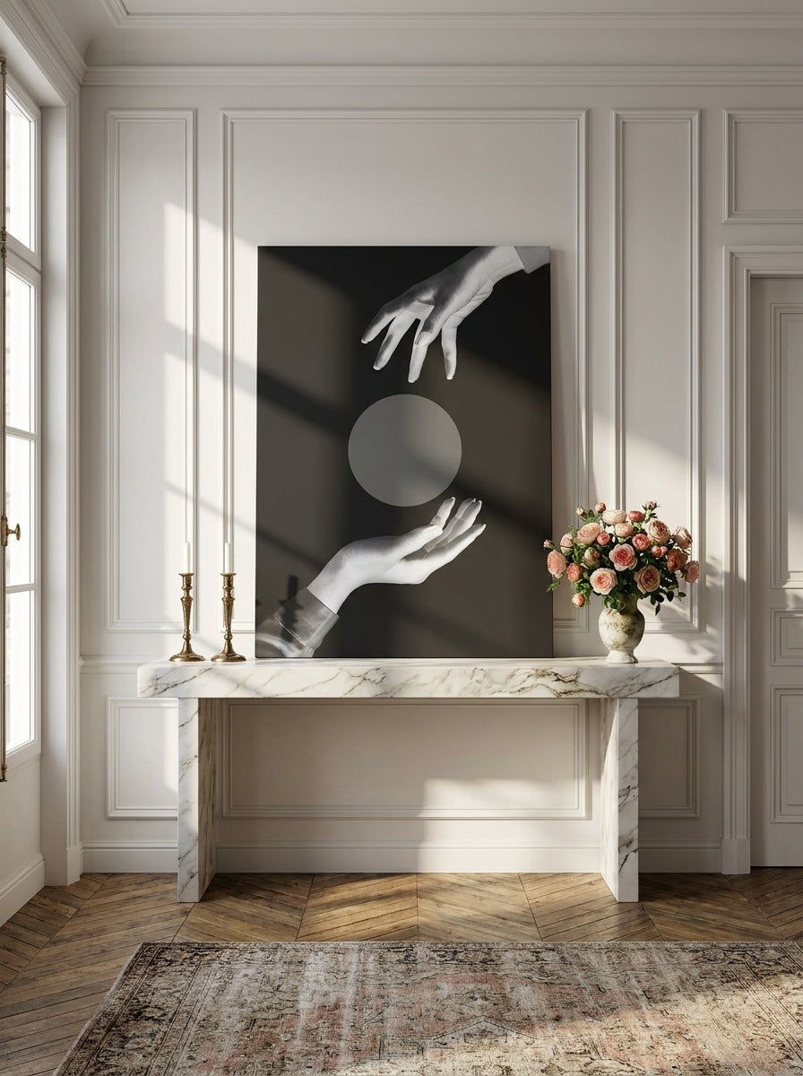 Stretched canvas wall art standing on a console in a Parisian home office