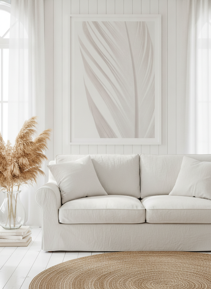 Oversized statement modern wall art print styled on the wall in a coastal living room