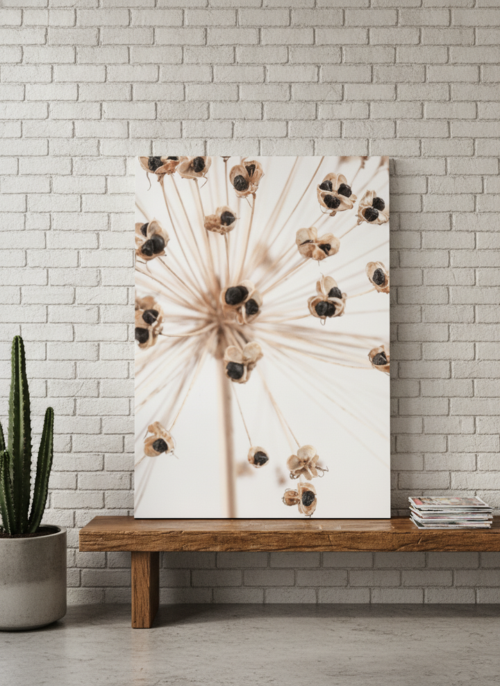 Stretched canvas wall art standing on a bench in an industrial loft bedroom