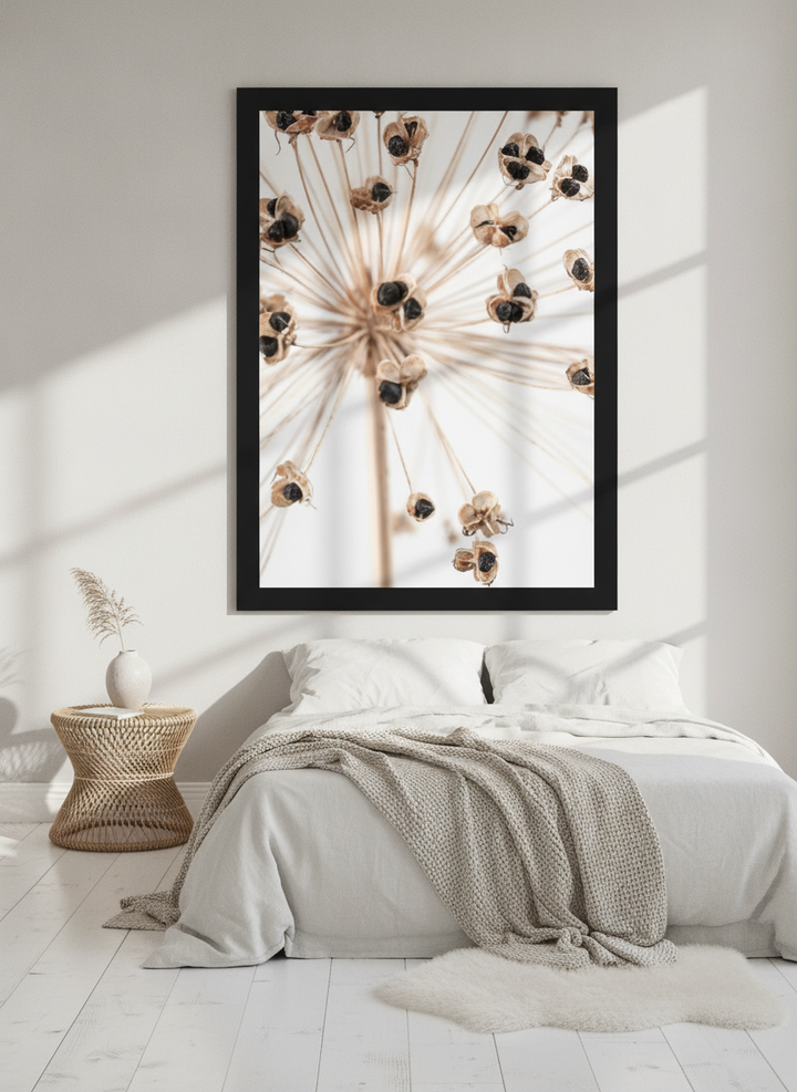 Oversized statement modern wall art print styled on the wall in a bright Scandinavian bedroom