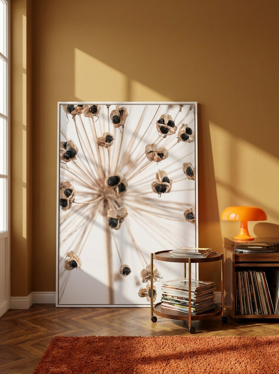 Oversized statement canvas wall art with a white surround leaning against the wall in a retro 70s dining room
