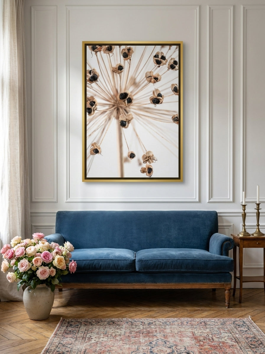 Canvas wall art with a gold leaf surround styled on the wall in a Parisian living room