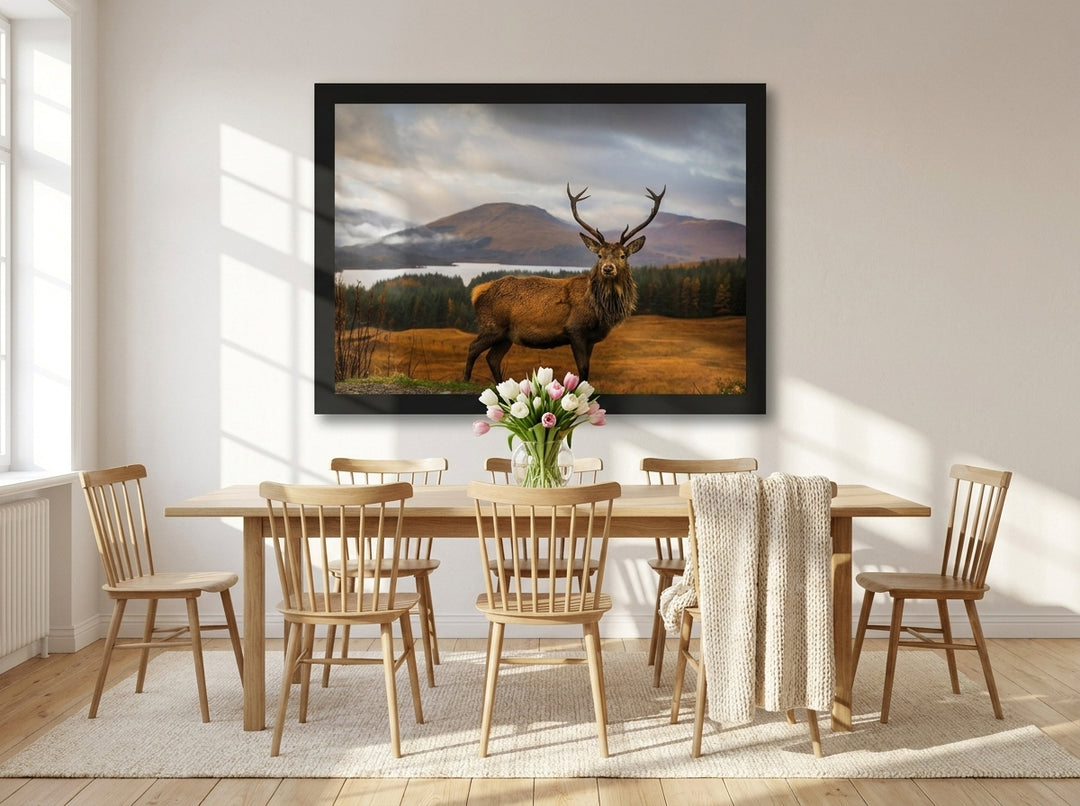 Modern wall art print styled on the wall in a bright Scandinavian dining room