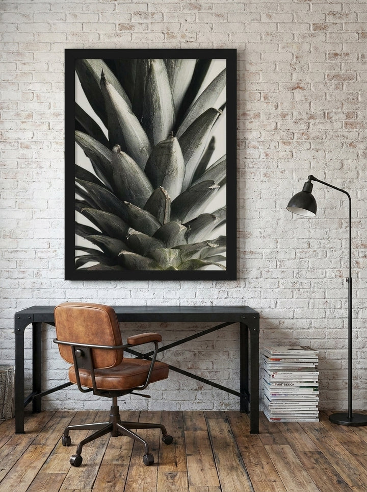 Modern wall art print styled on the wall in an industrial loft home office