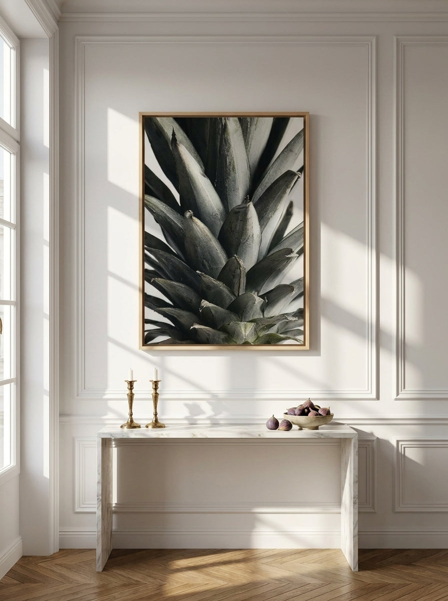 Oversized statement canvas wall art with a natural timber surround styled on the wall in a Parisian living room
