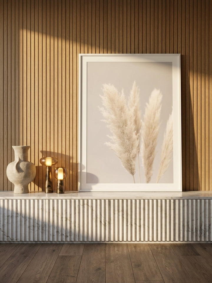 Modern wall art print standing on a sideboard in a luxe bedroom