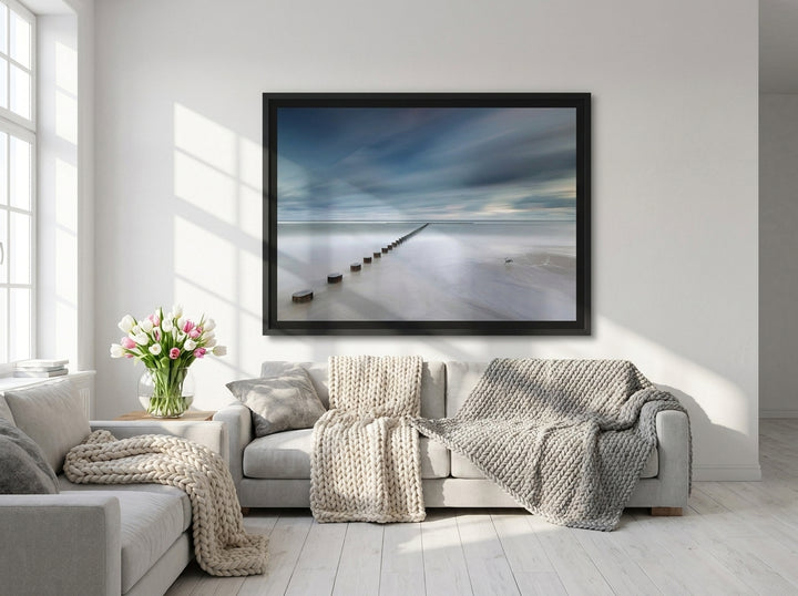 Oversized statement modern wall art print styled on the wall in a bright Scandinavian living room
