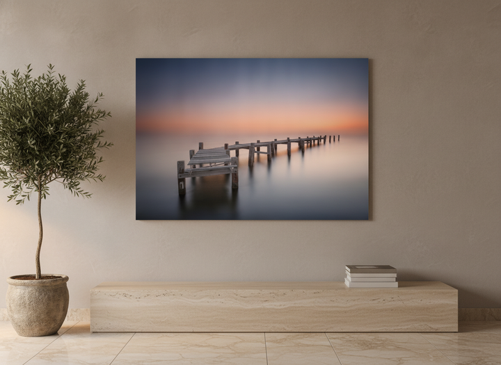 Stretched canvas wall art styled on the wall in a luxe living room