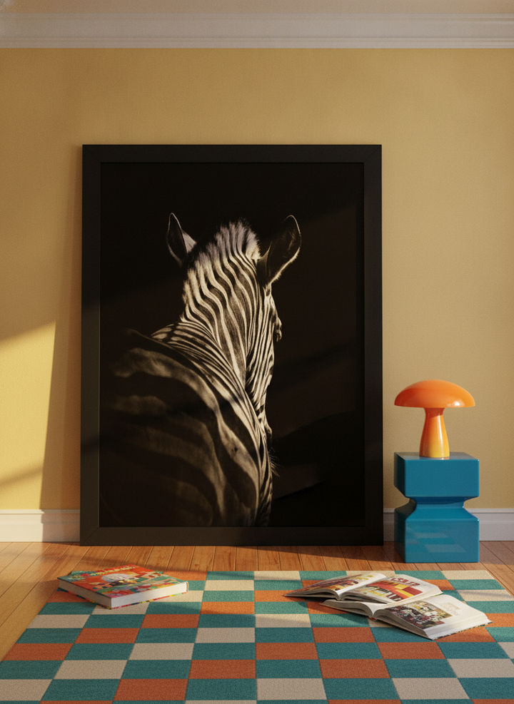 Oversized statement modern wall art print leaning against the wall in a colourful eclectic living room