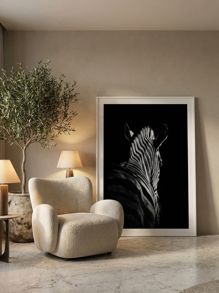 Oversized statement modern wall art print leaning against the wall in a luxe bedroom
