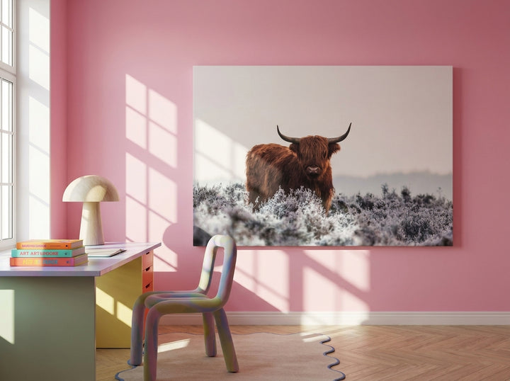 Stretched canvas wall art styled on the wall in a colourful eclectic home office