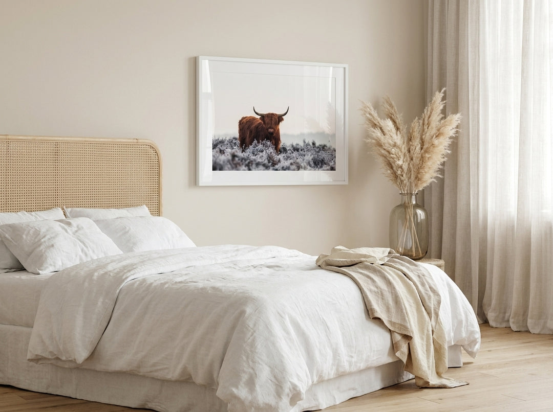 Modern wall art print styled on the wall in a coastal bedroom