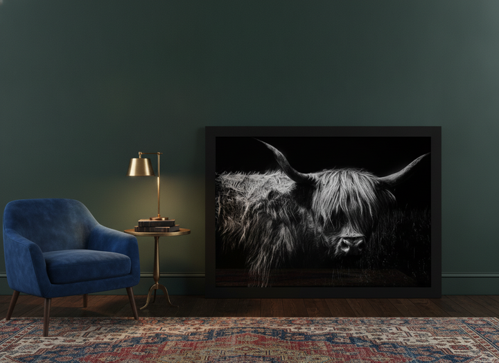 Modern wall art print leaning against the wall in a moody home office