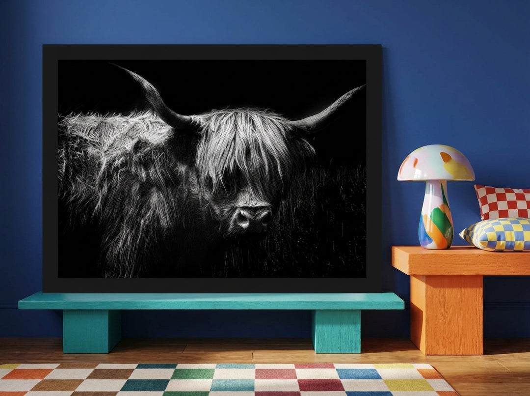 Modern wall art print standing on a side table in a colourful eclectic home office