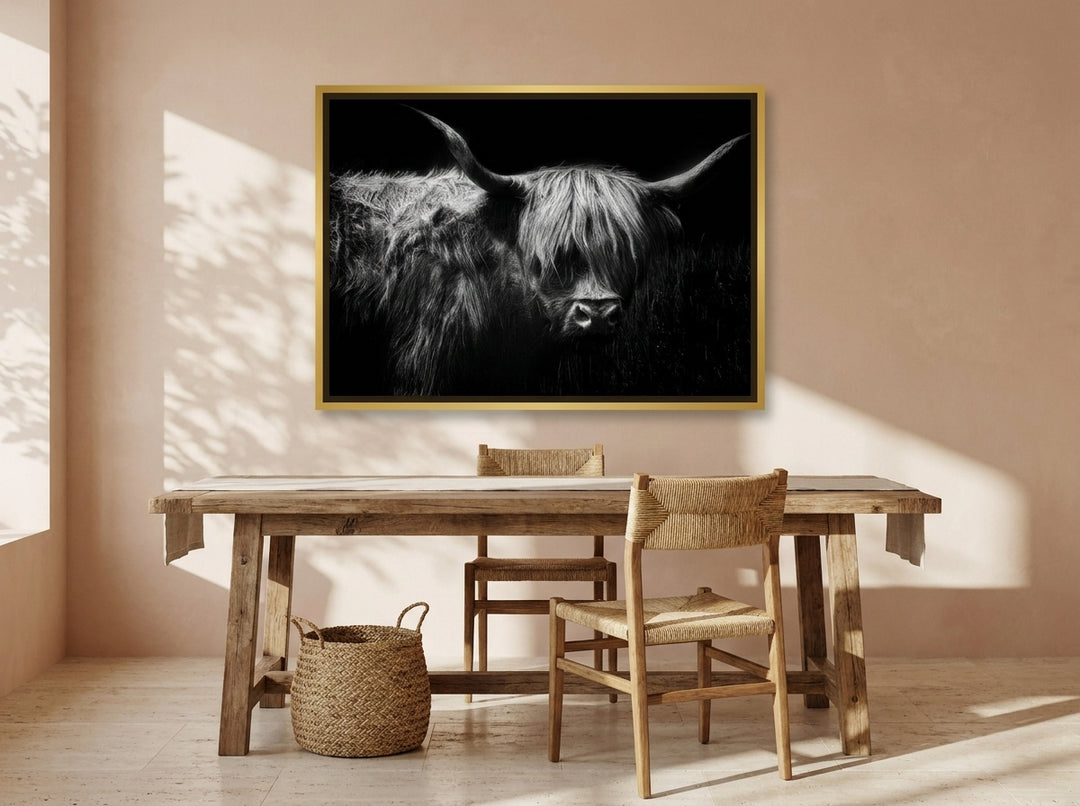 Canvas wall art with a gold leaf surround styled on the wall in a Mediterranean home office