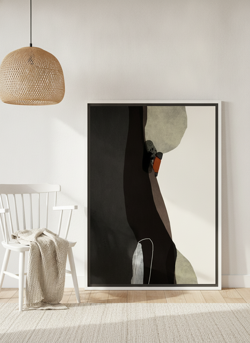 Canvas wall art with a white surround leaning against the wall in a bright Scandinavian home office