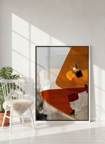 Canvas wall art with a white surround leaning against the wall in a bright Scandinavian home office