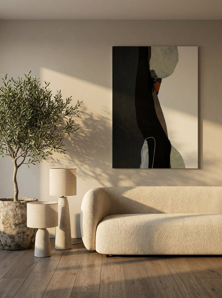 Stretched canvas wall art styled on the wall in a luxe living room
