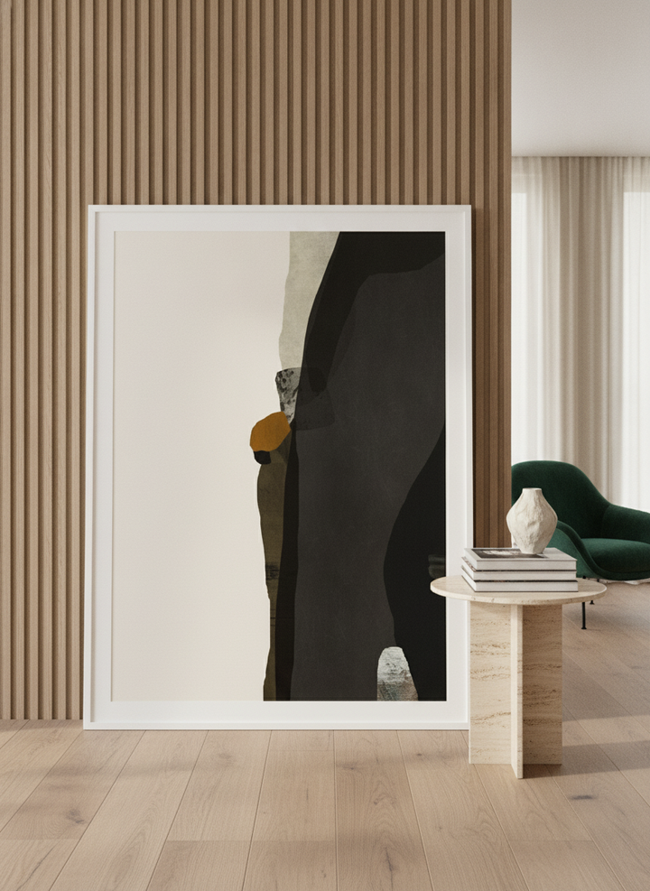 Oversized statement modern wall art print leaning against the wall in a luxe living room