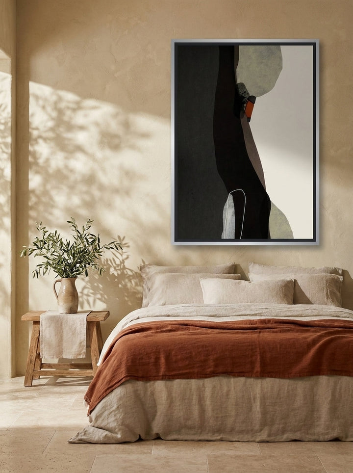 Canvas wall art with a silver leaf surround styled on the wall in a Mediterranean bedroom