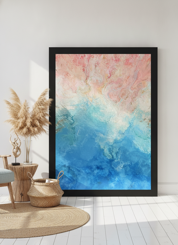 Oversized statement modern wall art print leaning against the wall in a coastal bedroom