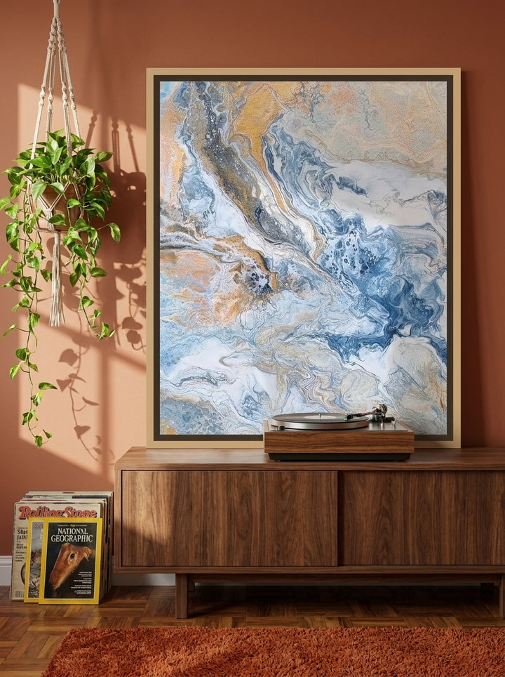 Canvas wall art with a natural timber surround standing on a sideboard in a retro 70s home office