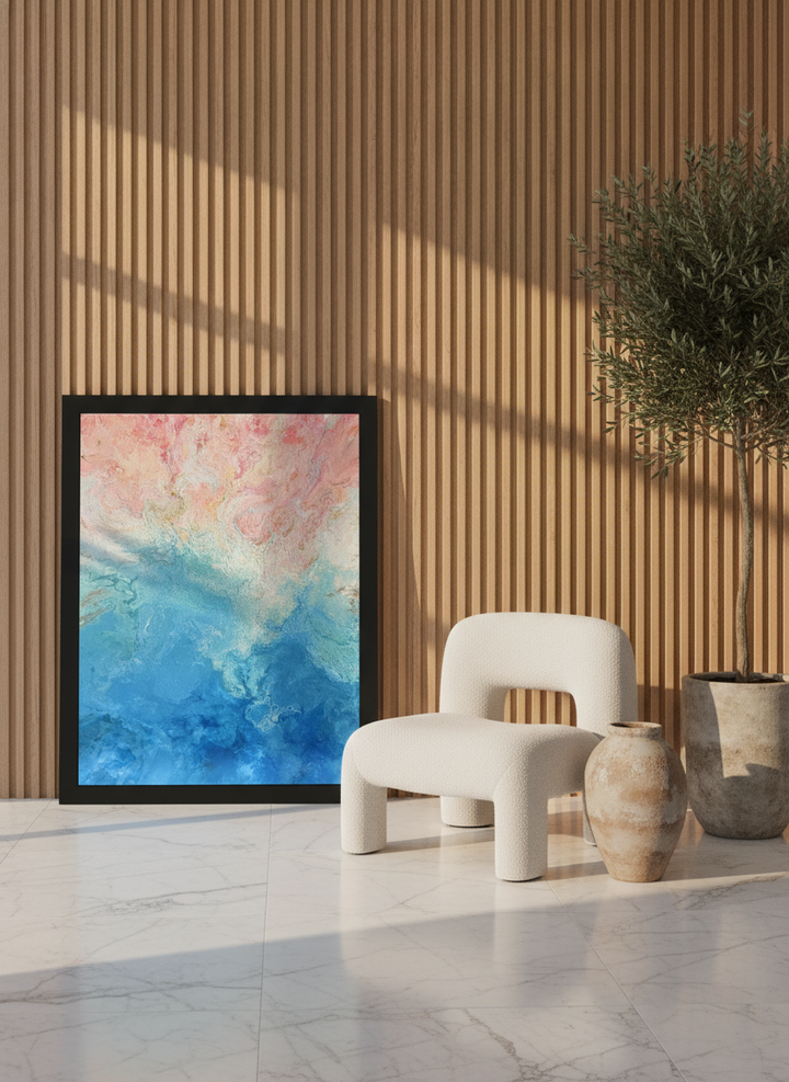 Modern wall art print leaning against the wall in a luxe living room