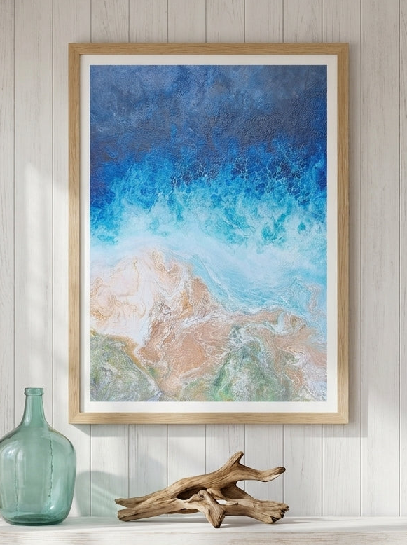 Modern wall art print styled on the wall in a coastal living room